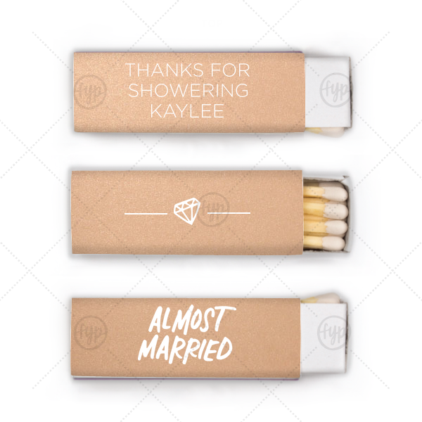 Almost Married Diamond Match | ForYourParty's personalized Stardream Rose Gold Lipstick Matchbox with Matte White Foil Color has a Almost Married graphic and a Diamond graphic and is good for use in Wedding themed parties and showers and couldn't be more perfect. It's time to show off your impeccable taste.